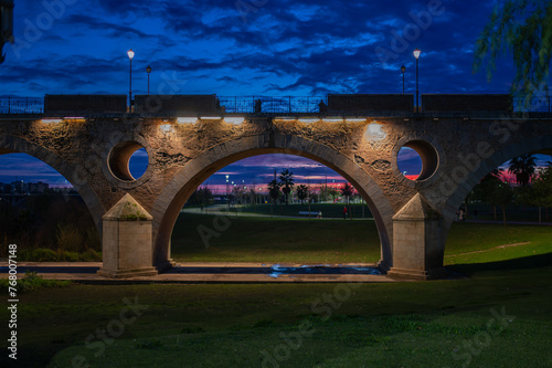 Perspectiva serena: Atardecer en el Puente de Palmas, Badajoz photo
