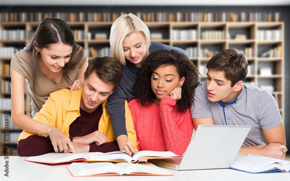 Group of smiling students study together Group of smiling students study together