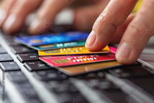 Man entered credit card information on a laptop. By emphasizing the convenience of online shopping.