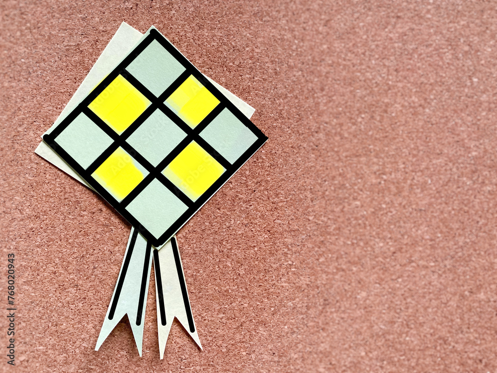 Ketupat made of paper craft with copy space background. Symbolism of ...