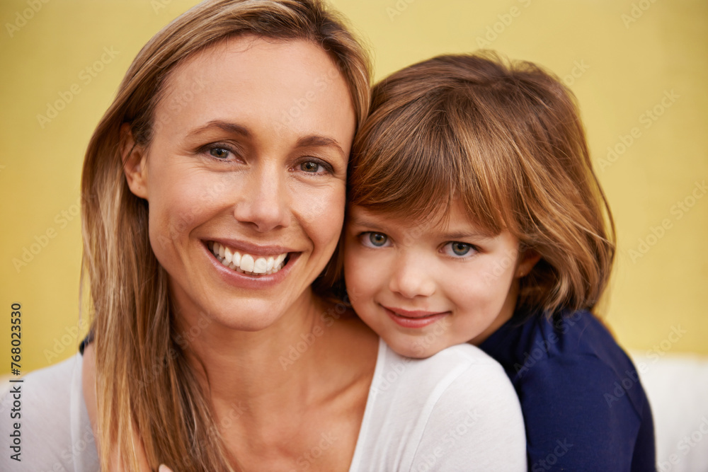 Smile, hug and portrait of mother with child bonding with positive, good and confident attitude. Happy, excited and girl kid embracing mom with love, care and support in living room at family home. Smile, hug and portrait of mother with child bonding with positive, good and confident attitude. Happy, excited and girl kid embracing mom with love, care and support in living room at family home.
