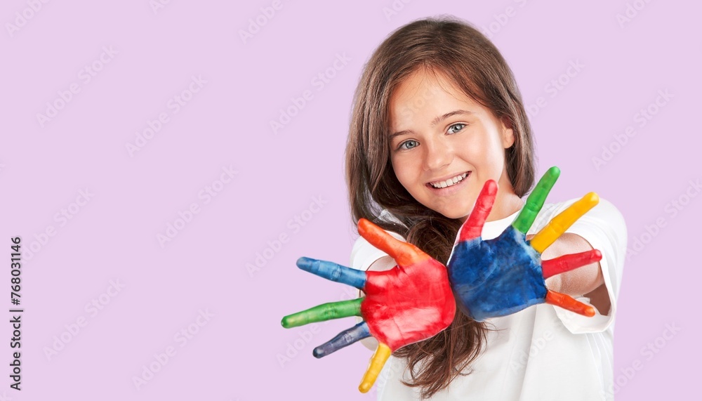 A beautiful little child with multicolored hands A beautiful little child with multicolored hands