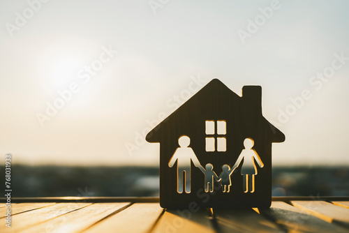 Family and house model, Security protection and health insurance. The concept of family home, protection, travel insurance, house insurance. photo