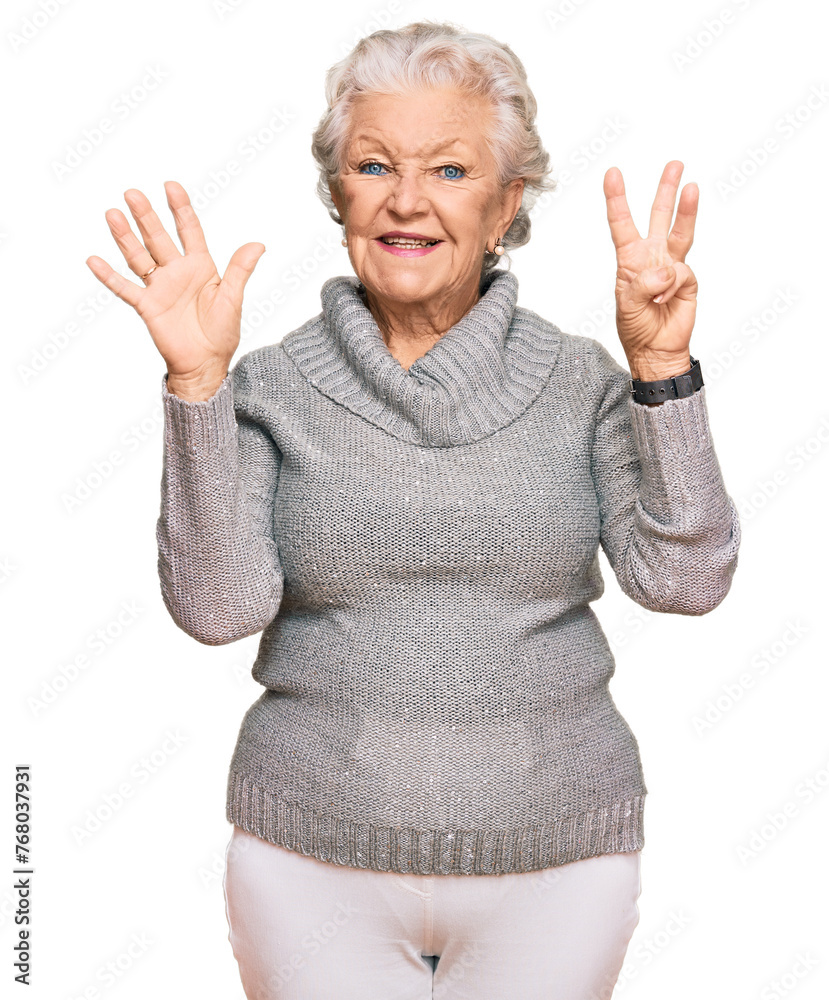 Senior grey-haired woman wearing casual winter sweater showing and pointing up with fingers number eight while smiling confident and happy. Senior grey-haired woman wearing casual winter sweater showing and pointing up with fingers number eight while smiling confident and happy.