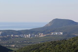 view of the city of Alushta and Mount Kostel from Mount Demerdzhi on a sunny summer day in Crimea
