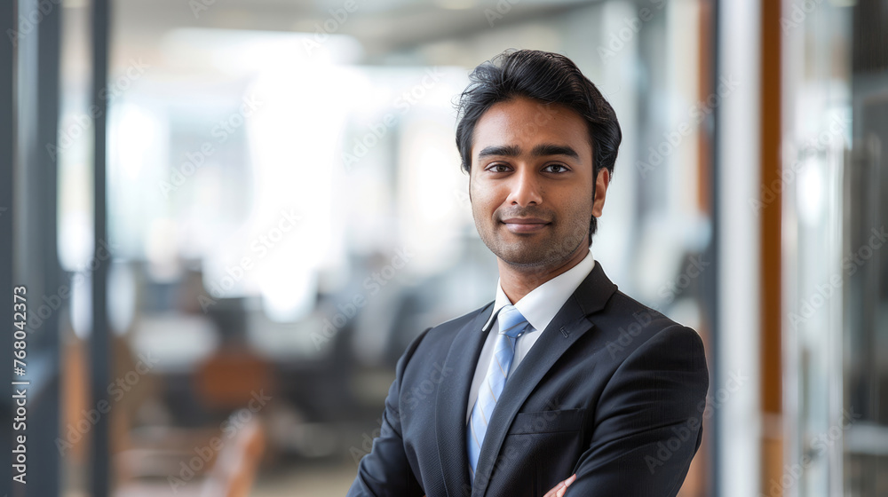 Young professional Indian businessman in the office Young professional Indian businessman in the office