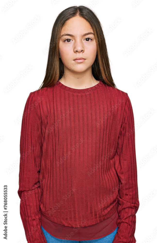 Beautiful brunette little girl wearing casual sweater relaxed with serious expression on face. simple and natural looking at the camera. Beautiful brunette little girl wearing casual sweater relaxed with serious expression on face. simple and natural looking at the camera.