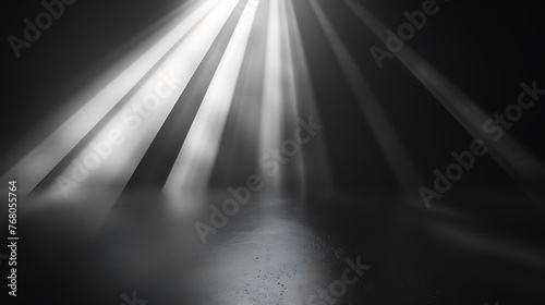 Black and white spotlight.rays from above. photo