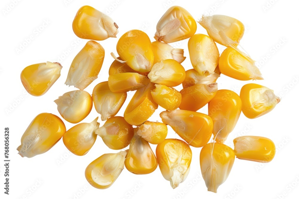 Fototapeta premium several kernels of corn, also isolated against a white background. Their bright yellow color stands out, which could make this a great image for something related to agriculture, cooking, or nutrition