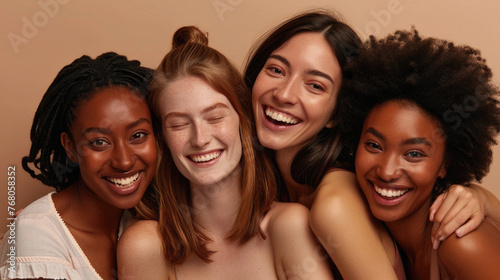 Group of diverse women with different skin types smiling and looking at camera