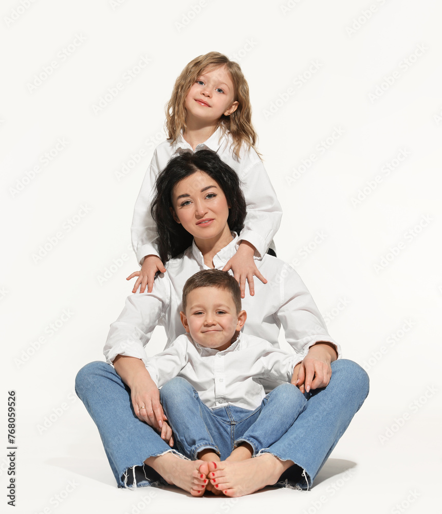 Little children with their mother on white background. Space for text Little children with their mother on white background. Space for text