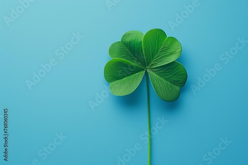 a four leaf clover on a blue background