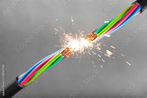 Foto Sparks explosion at electrical cables hazard concept