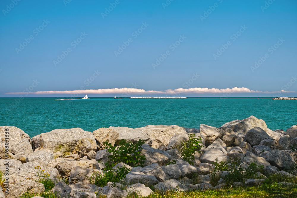 Rolling clouds at a distance and light houses - Goderich, ON, Canada