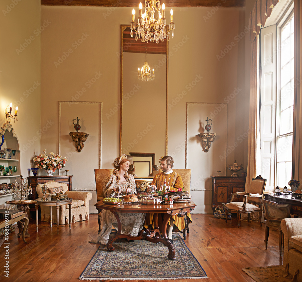 Noble, couple and wealth with food, dinner and renaissance home or ...