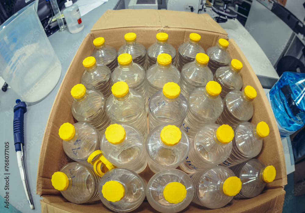 Αυτοκόλλητο illegal alcohol prepared for testing in a police forensic laboratory in Warsaw,