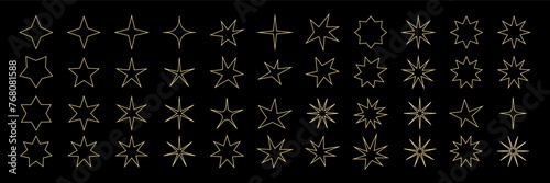 Brutalism stars. Minimalistic geometric gold outline stars on a black background. Contemporary forms. Isolated floral elements silhouettes. Abstract contour shapes. Vector graphic set illustration