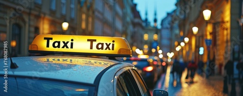 Amidst the bustling city streets, a bright yellow taxi flashes its illuminated sign atop its sleek car, beckoning passengers to embark on a journey through the urban landscape.