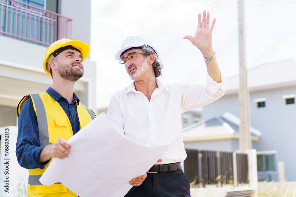 Foreman and client having a discussion. Foreman and client having a discussion.