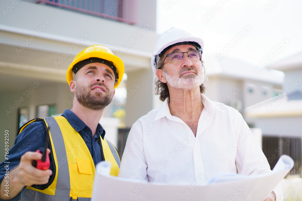Foreman and client having a discussion. Foreman and client having a discussion.