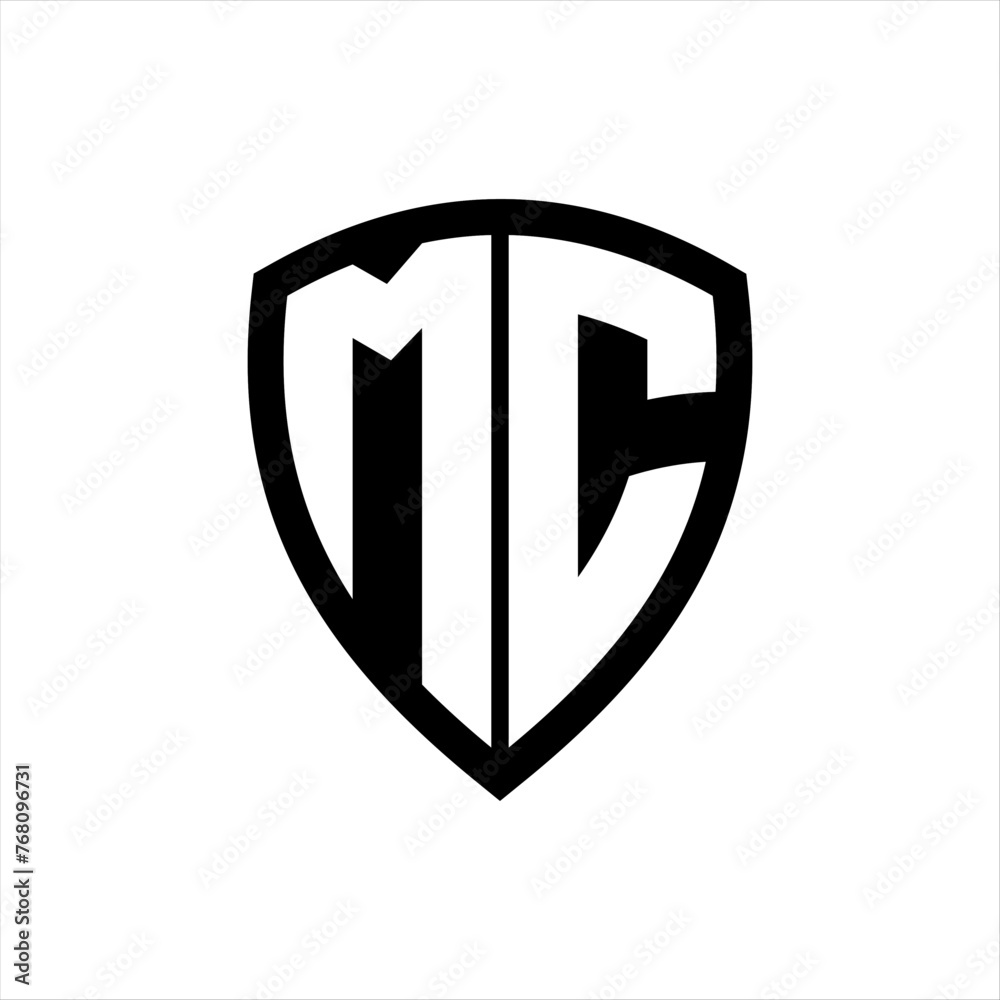 MC monogram logo with bold letters shield shape with black and white color design MC monogram logo with bold letters shield shape with black and white color design