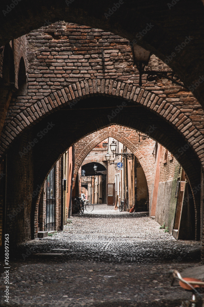 Fototapeta premium old stone arch in Ferrara in Italy