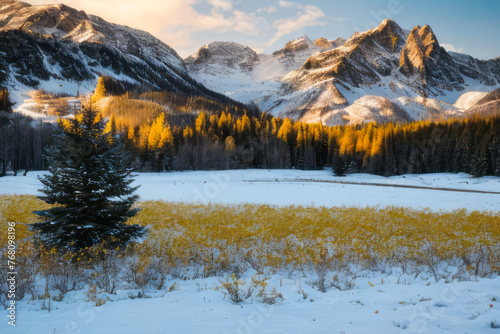 Breathtaking panorama of Colorado's fall mountains bathed in a colorful sunrise, with a calm lake reflecting the snow-capped peaks