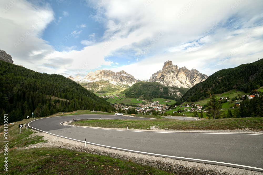 Picturesque Dolomites landscape with mountain Picturesque Dolomites landscape with mountain serpentine road. Passo Gardena or Grödner Joch. Alps, South Tirol, Dolomites mountains