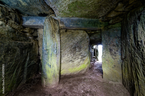 Bryn Celli Ddu complex Neolithic site showing passage into tomb chamber interior and massive shaped monolith of blueschist stone. Anglesey, Wales photo