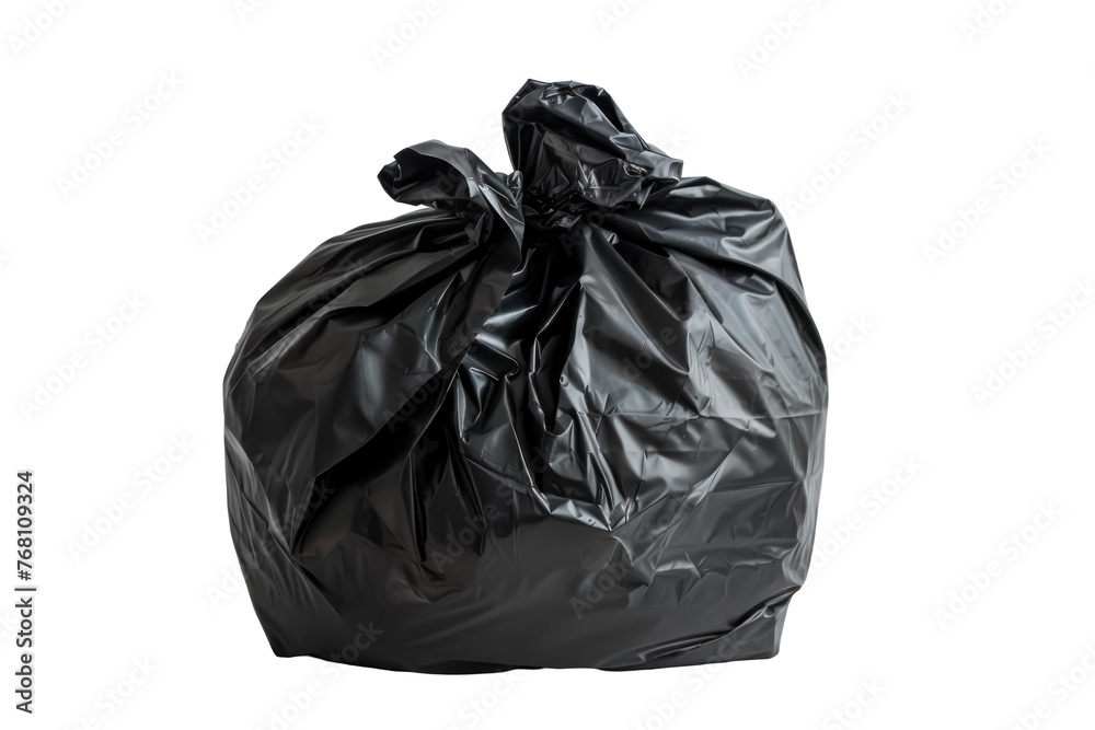A black plastic bag is sitting on a white background