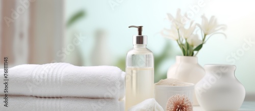 Spa Background   Toiletries  soap  towels  creams and lotions on blurred white bathroom