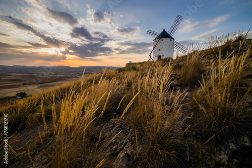Windmills at sunset in Consuegra, Castile-La Mancha, Spain photo