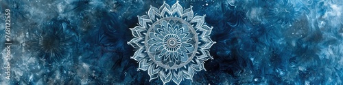 a captivating mandala on a steel blue canvas, emphasizing the fine details and cool tones with exceptional clarity. © Lal