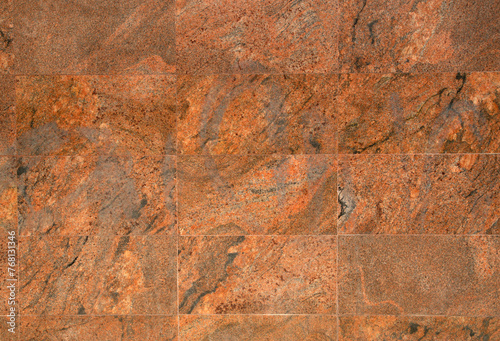 New colorful brown stone wall close up