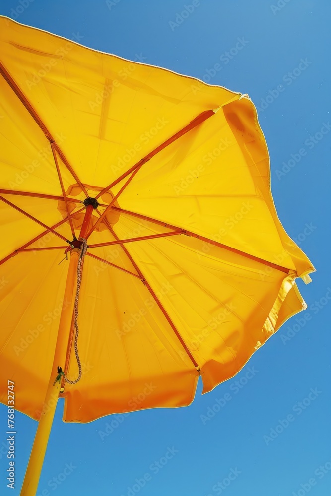 Summer Fun with a Yellow Beach Umbrella on a Colorful Beach