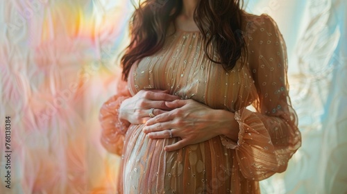 Close view of a joyful expectant mother, her pregnancy belly a symbol of life