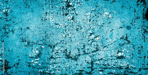 blue wall painted with white old peeling paint