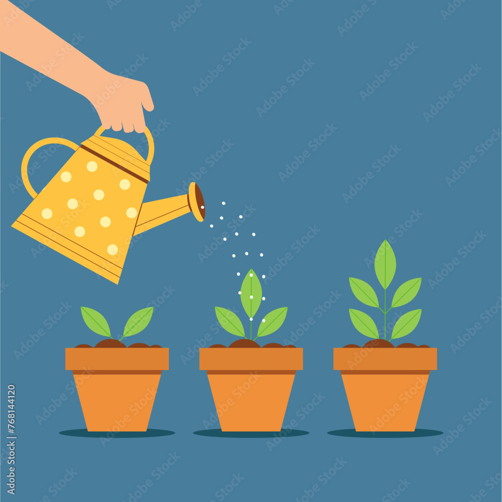 Hand Holding Watering Can Watering Plant