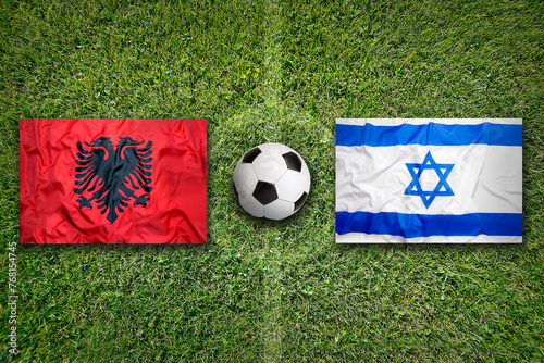 Albania vs. Israel flags on soccer field