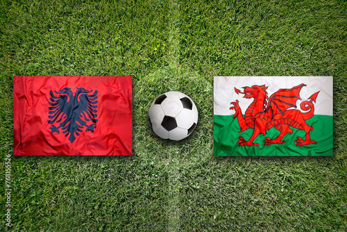 Albania vs. Wales flags on soccer field