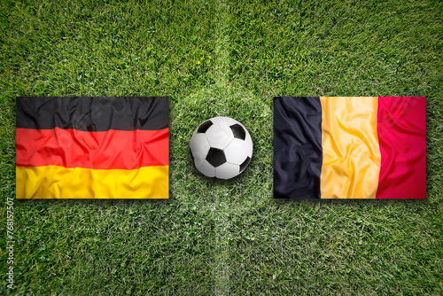 Germany vs. Belgium flags on soccer field