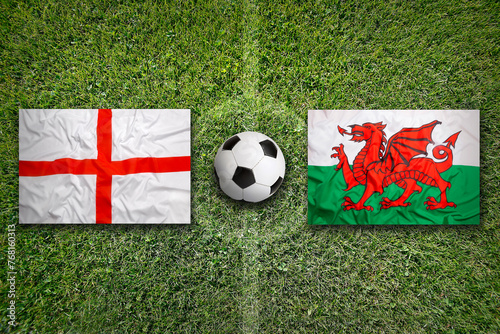 England vs. Wales flags on soccer field