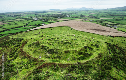 Castell Odo late Bronze Age through Iron Age hillfort on Mynydd Ystum hill. Near Aberdaron, Llyn, north Wales. Aerial looking N.E. photo