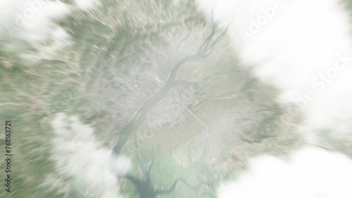 Earth zoom in from space to Sinuiju, North Korea. Followed by zoom out through clouds and atmosphere into space. Satellite view. Travel intro. Images from NASA photo