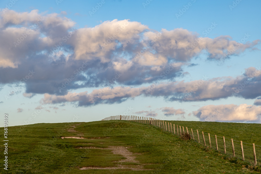 A rural Sussex view with evening light on Ditchling Beacon