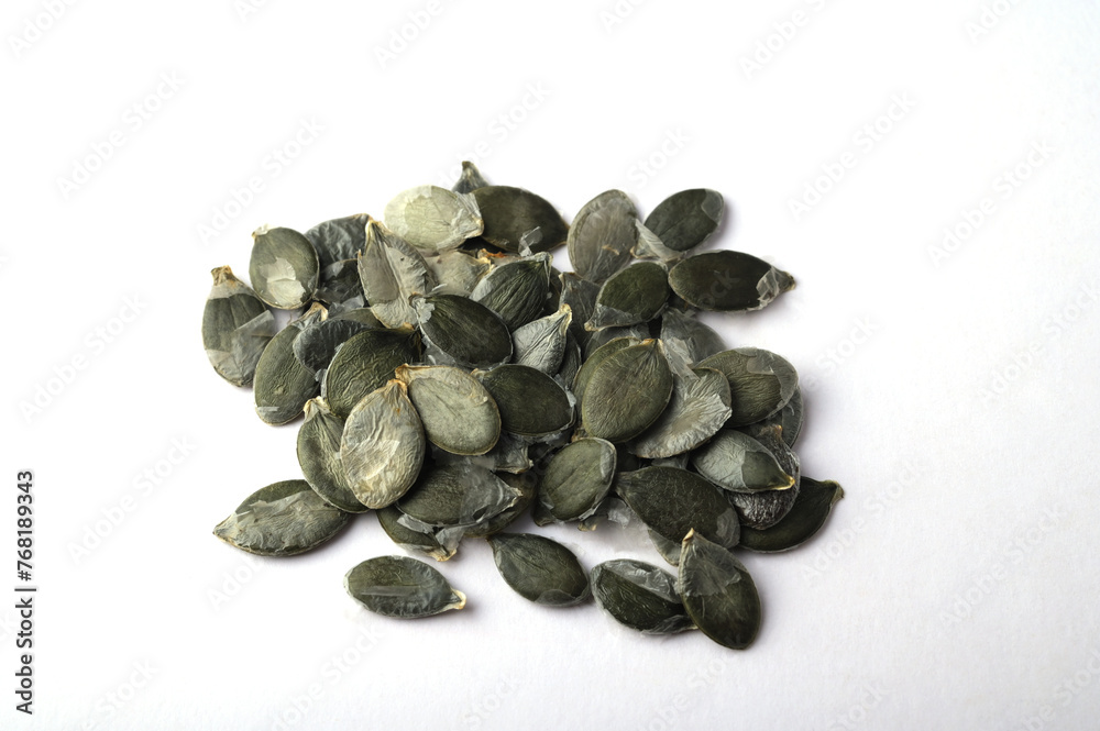 Obraz premium pumpkin seeds on white background.