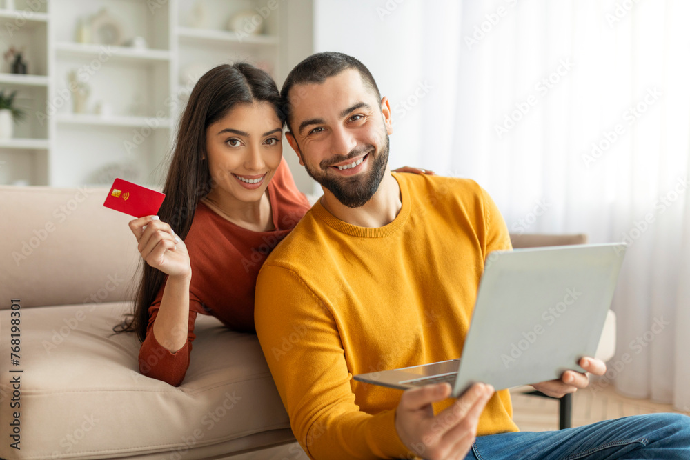 Couple with credit card shopping online Couple with credit card shopping online