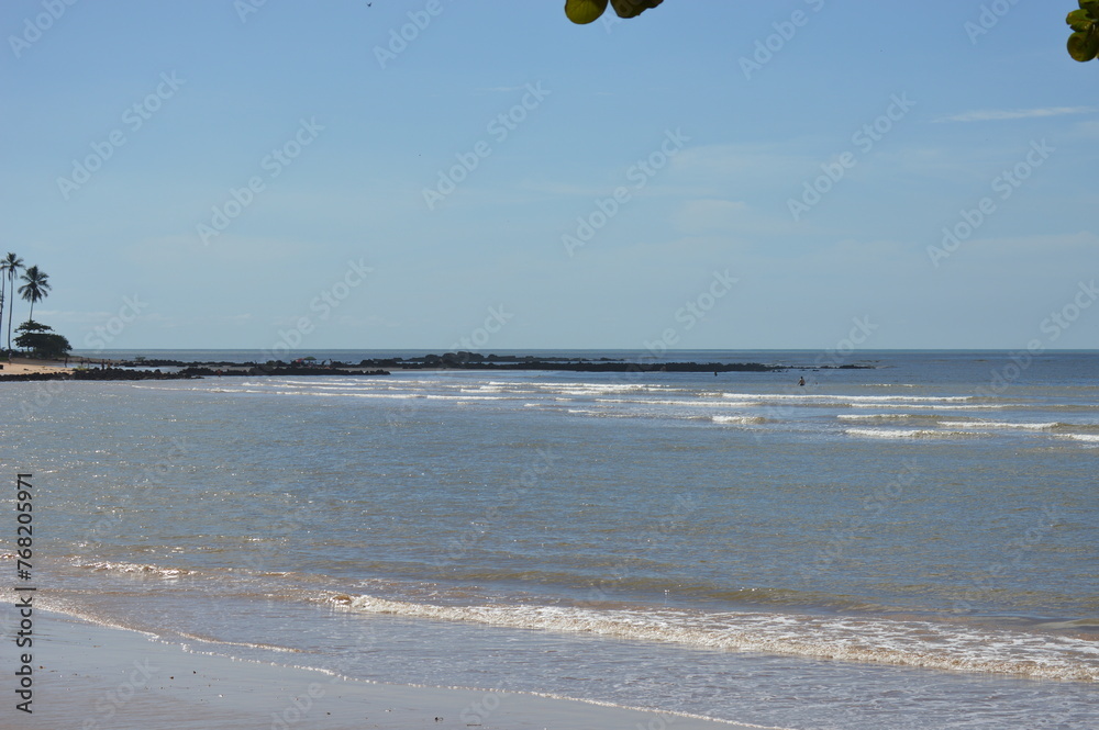 The beautiful blue sea at Aracruz beach on the coast of Espirito Santo, Brazil
