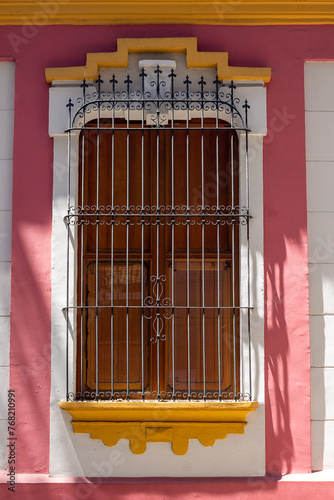 Traveling through Venezuela, long window of a colonial house in the historic center of Caracas