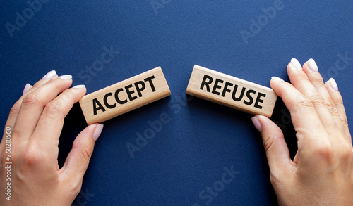Accept or Reject symbol. Concept word Accept or Reject on wooden blocks. Businessman hand. Beautiful deep blue background. Business and Accept or Reject concept. Copy space